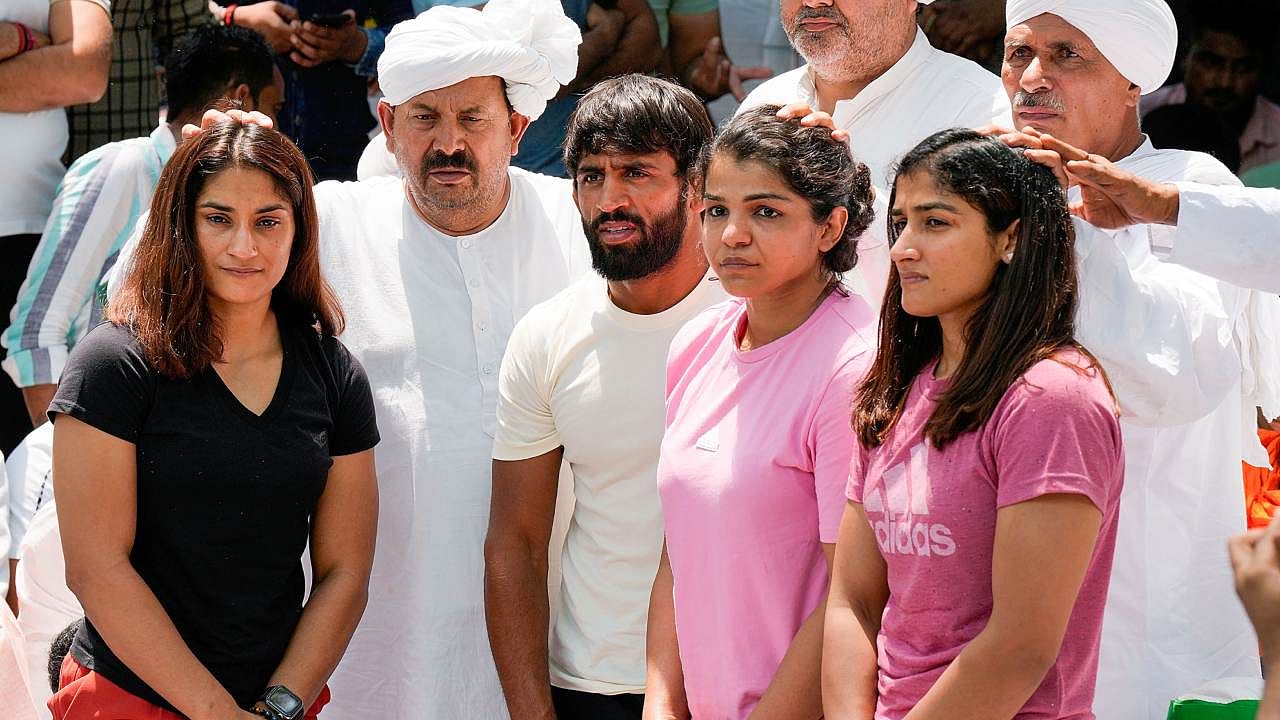 Wrestlers Bajrang Punia, Vinesh Phogat, Sakshi Malik and Sangita Phogat during their protest at Jantar Mantar, in New Delhi. Credit: PTI Photo