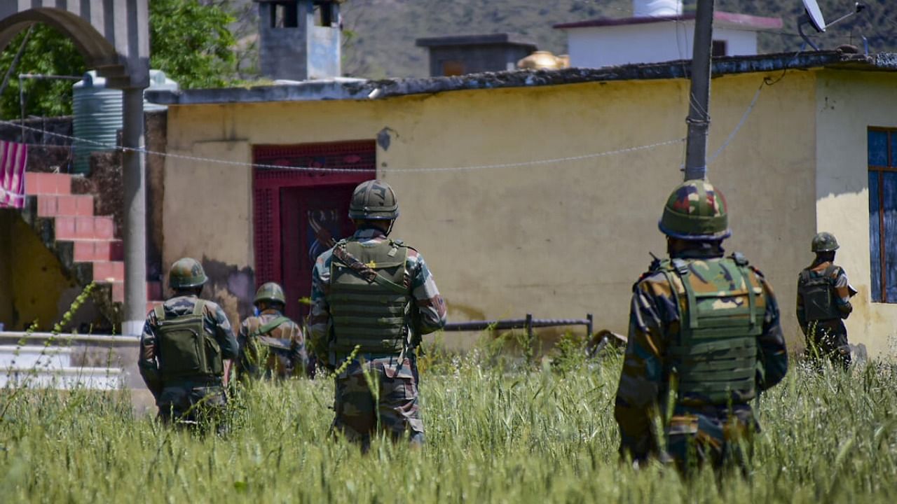 Security personnel during a cordon and search operation at the Bata-Doriya area in Poonch district. Credit: PTI Photo