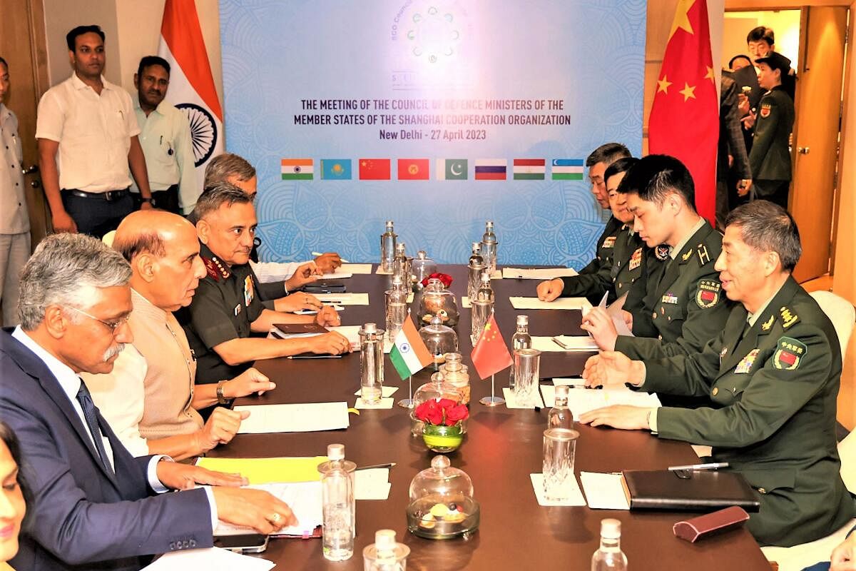 Bilateral meeting between India's Defence Minister Rajnath Singh and his Chinese counterpart Li Shangfu in New Delhi. Credit: AFP Photo/Indian Ministry of Defence