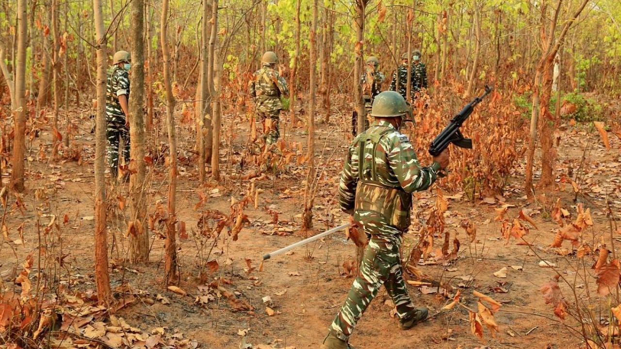 <div class="paragraphs"><p>Representative image showing CRPF personnel during a combing operation against naxal activities in the dense forest area.</p></div>