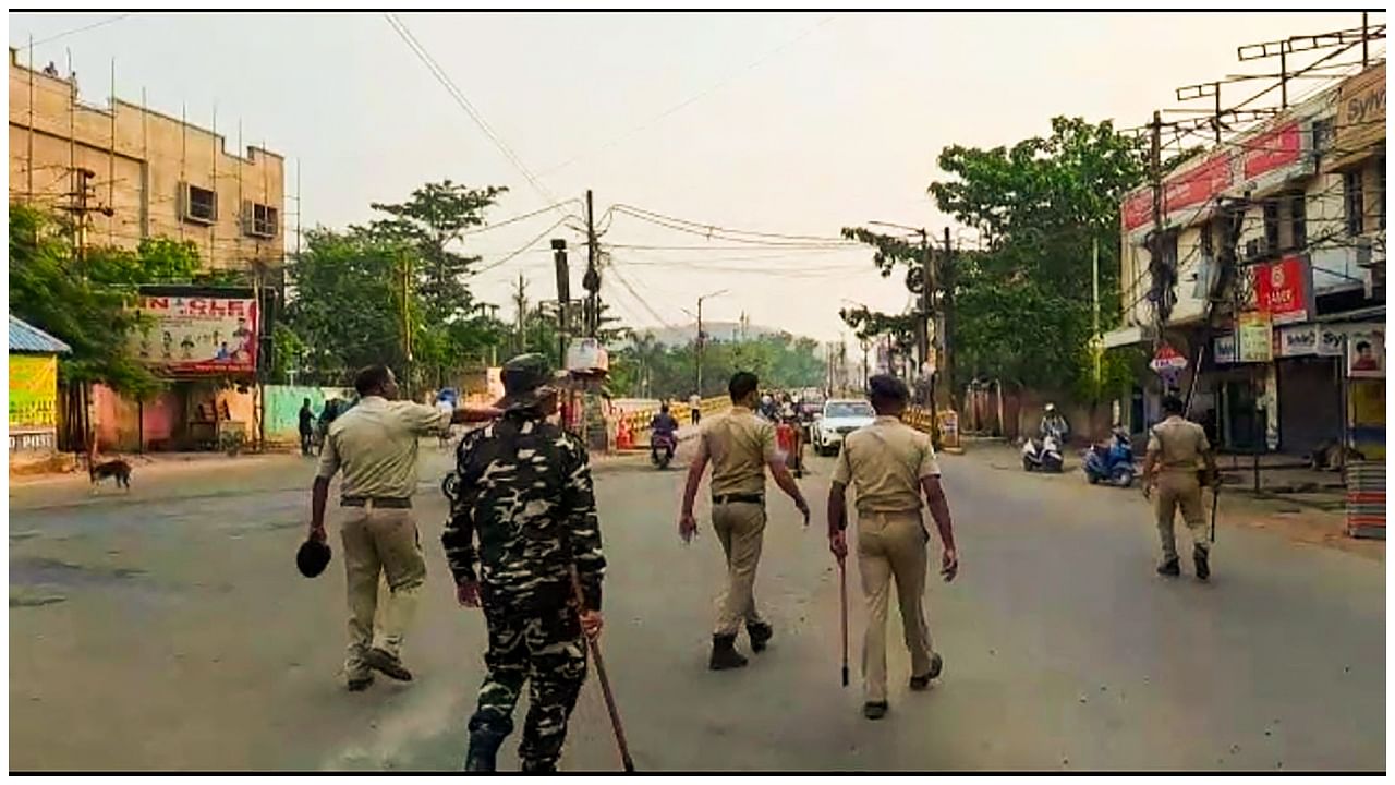 Sambalpur: Security personnel during a curfew imposed after the incident of fresh violence on the occasion of Hanuman Jayanti, in Sambalpur, Saturday, April 15, 2023. Credit; PTI Photo