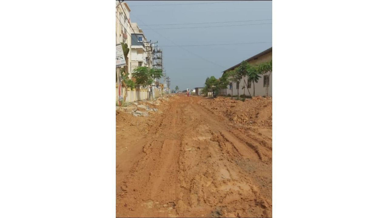 BBMP sources said that the road asphalting work cannot begin until the minor irrigation department completes its work. The BWSSB also recently completed its underground drain laying work on the same road, a BBMP official said. Credit: Special arrangement