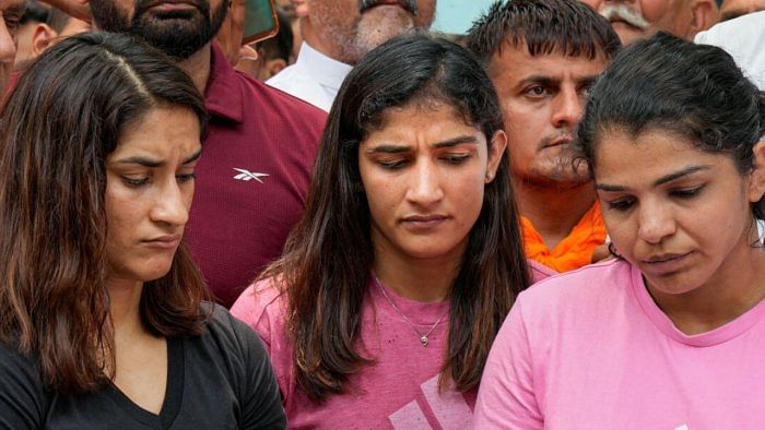 Wrestlers Vinesh Phogat, Sakshi Malik and Sangita Phogat during their protest at Jantar Mantar, in New Delhi, Thursday, April 27, 2023. Credit: PTI Photo