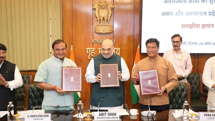 In this file photo, Amit Shah is seen with Assam CM Himanta Biswa Sarma and Arunachal Pradesh CM Pema Khandu where they signed a MoU. Credit: Assam Government