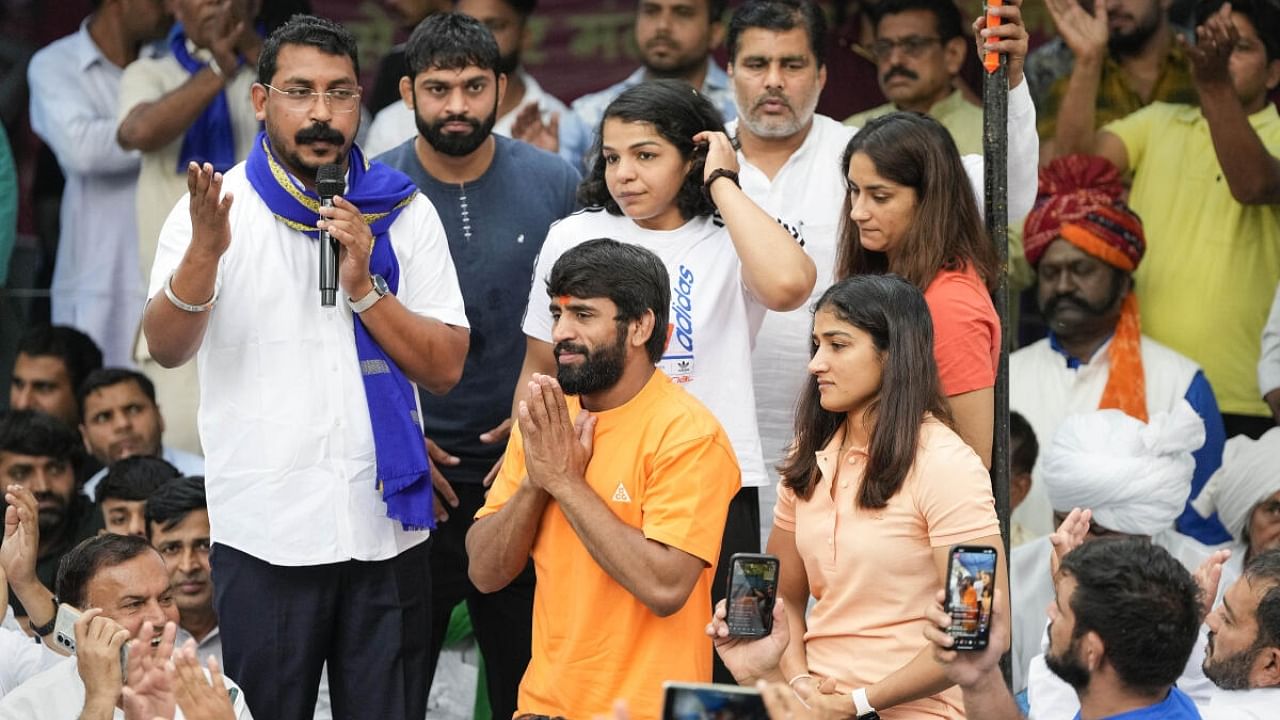 Bhim Army chief Chandra Shekhar Azad with wrestlers Bajrang Punia, Vinesh Phogat and Sakshi Malik during their protest at Jantar Mantar, in New Delhi. Credit: PTI Photo