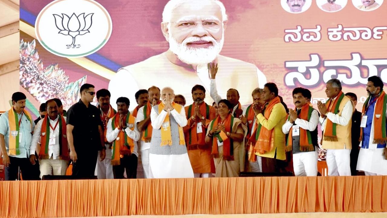 Prime Minister and senior BJP leader Narendra Modi during a public meeting for the upcoming Karnataka Assembly elections in Kolar district. Credit: PTI Photo