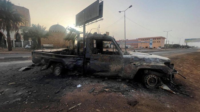 A burned vehicle is seen in Khartoum, Sudan. Credit: Reuters File Photo 