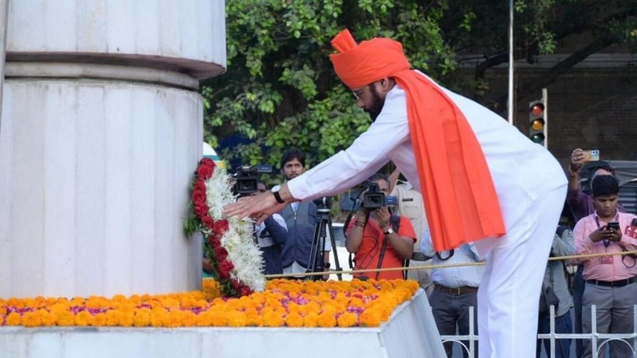  Maharashtra Chief Minister Eknath Shinde lays a wreath at Hutatma Chowk to pay tribute to those who sacrificed their lives for the 'Samyukta Maharashtra Movement' on the occasion of 63rd Maharashtra Foundation Day, in Mumbai. Credit: PTI Photo
