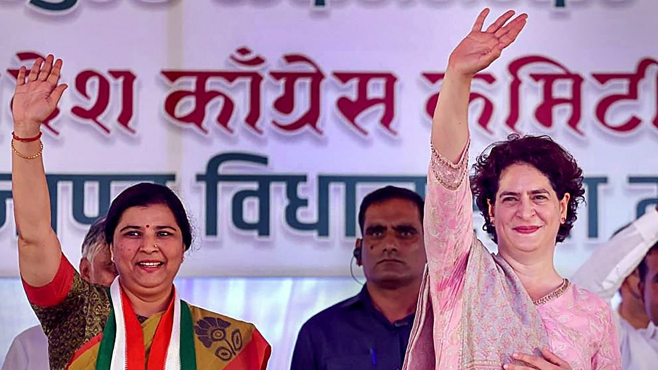 AICC General Secretary Priyanka Gandhi Vadra waves at Congress supporters during a public meeting for the upcoming Karnataka Assembly elections, in Khanapur in Belagavi district, Sunday, April 30, 2023. Credit: PTI Photo