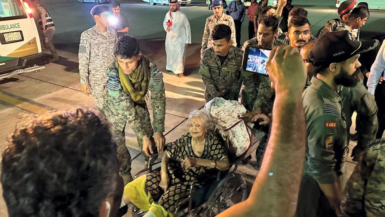 Elderly Indians evacuated from violence-hit Sudan under 'Operation Kaveri', being assisted upon their arrival in Jeddah, Saudi Arabia. Credit: Twitter/@IndianEmbRiyadh