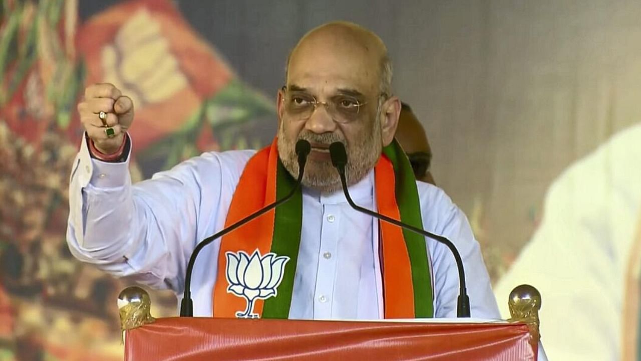 Union Home Minister Amit Shah at a public meeting for upcoming Karnataka Assembly polls in Chamarajanagar. Credit: PTI Photo