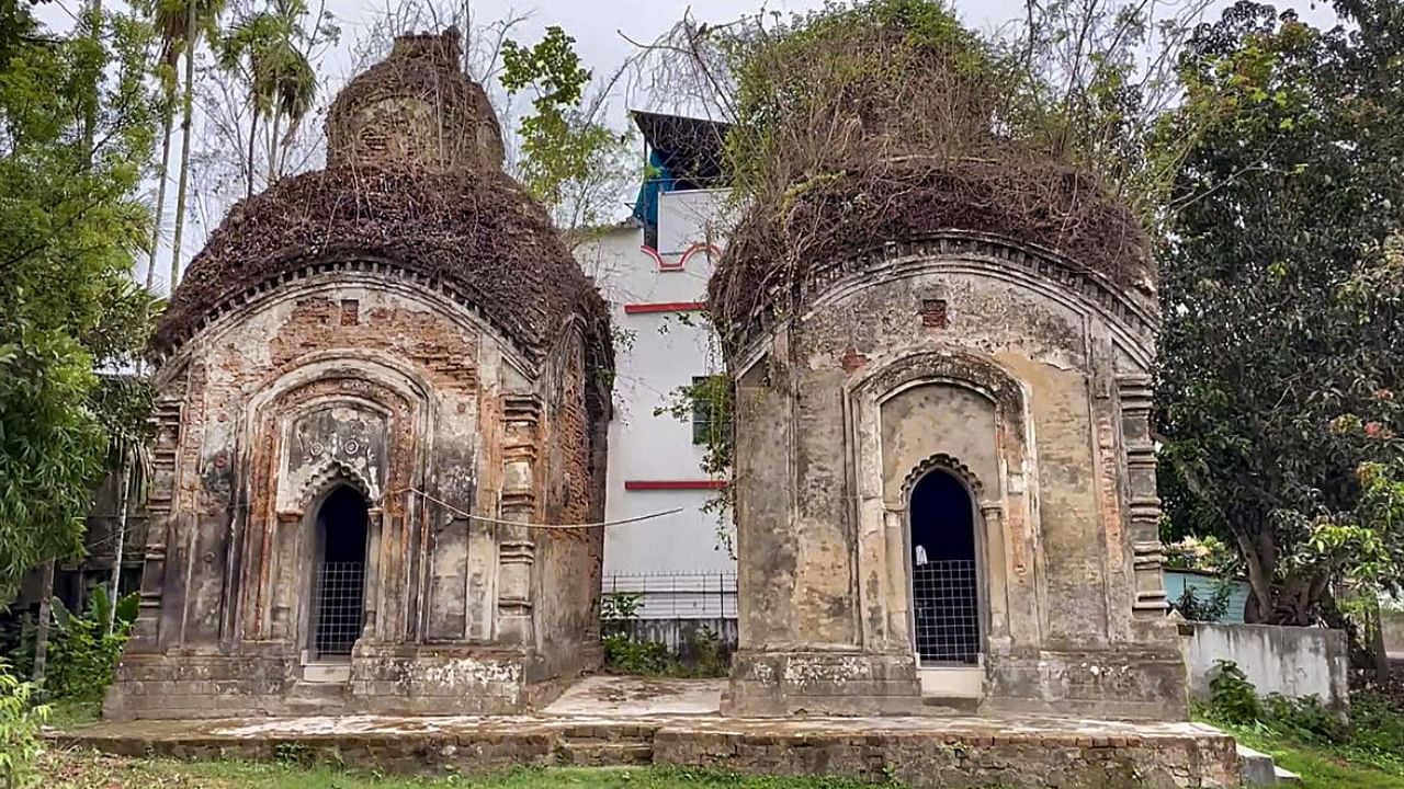 The twin Shiva Temples, shown in Ray's 'Pather Panchali', at Boral village, West Bengal, Credit: PTI Photo