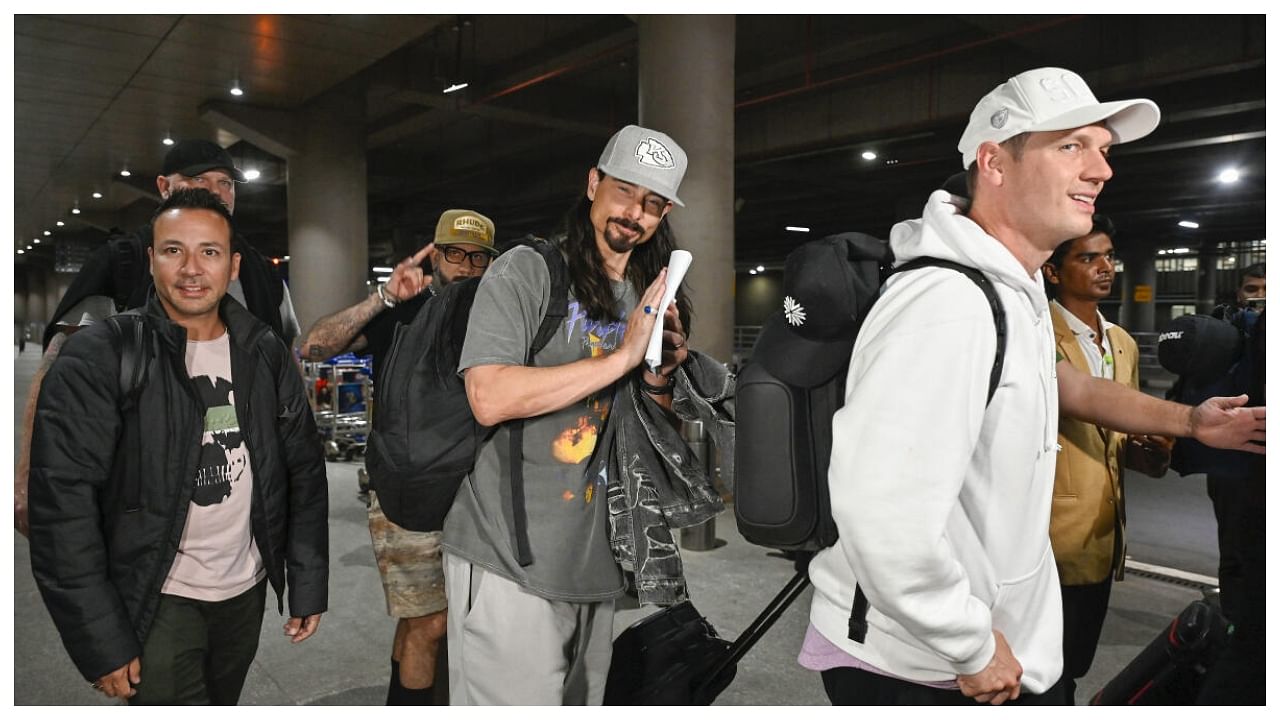 Nick Carter, Howie Dorough and Kevin Richardson, members of the American band Backstreet Boys, upon their arrival ahead of the DNA World Tour, in Mumbai, early Wednesday. Credit: PTI Photo