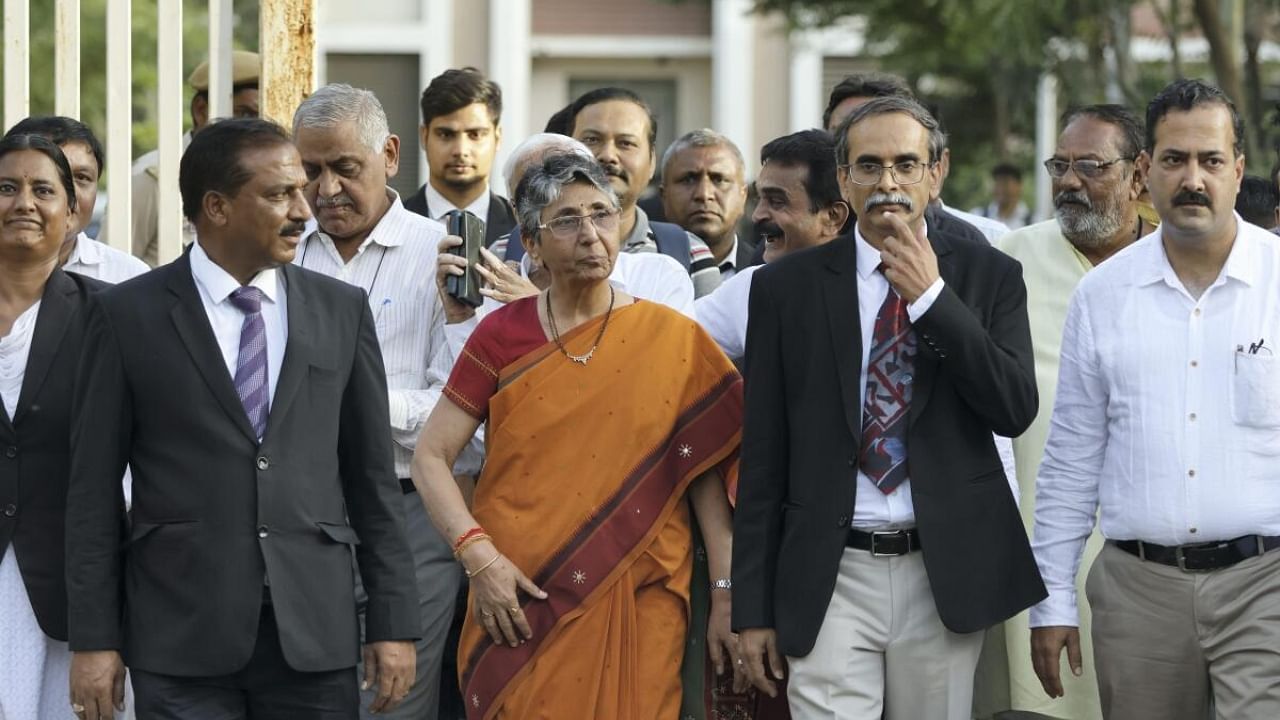 Ex-MLA Maya Kodnani along with advocates comes out of the Sessions Court after the verdict on Naroda Gam massacre case, in Ahmedabad. Credit: PTI Photo