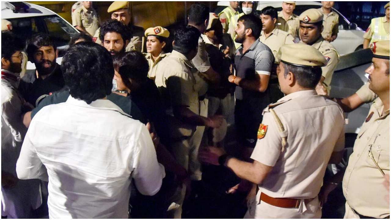A ruckus after an alleged scuffle between protesting wrestlers and the police at Jantar Mantar, in New Delhi, Wednesday, May 3, 2023. Credit: PTI Photo