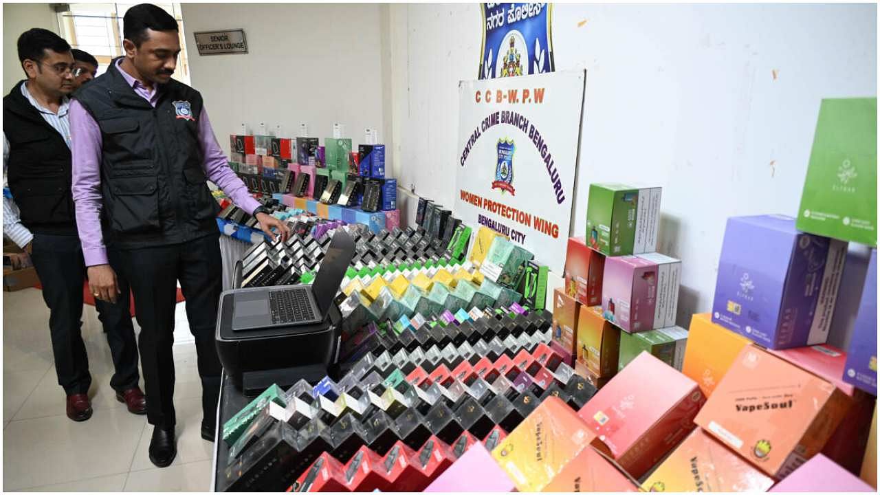 CCB officials inspect the seized items at the police commissioner's office on Infantry Road on Wednesday. DH Photo/B K Janardhan