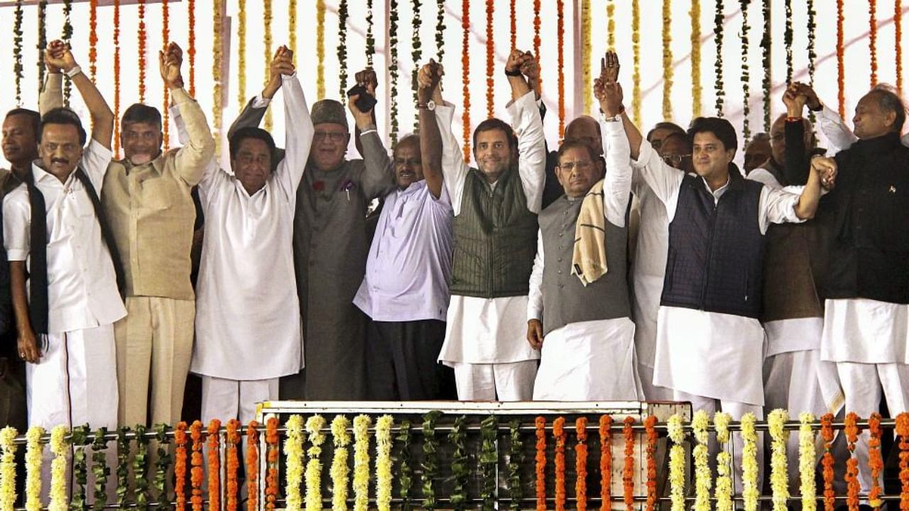 DMK chief MK Stalin, Andhra Pradesh Chief Minister N Chandrababu Naidu, newly sworn-in Madhya Pradesh Chief Minister Kamla Nath, NC chief Farooq Abdullah, Karnataka Chief Minister HD Kumaraswamy, Congress President Rahul Gandhi, Loktantrik Janata Dal chief Sharad Yadav, Congress leader Jyotiraditya Scindia, newly sworn-in Rajasthan Chief Minsiter Ashok Gehlot, former prime minister HD Devegowda and others during the swearing-in-ceremony of Madhya Pradesh CM, in Bhopal, Dec. 17, 2018. Credit: PTI Photo