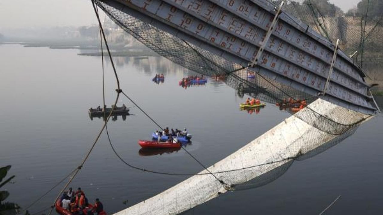 Rescue ops after the Morbi bridge collapsed on October 31, 2022. Credit: PTI Photo