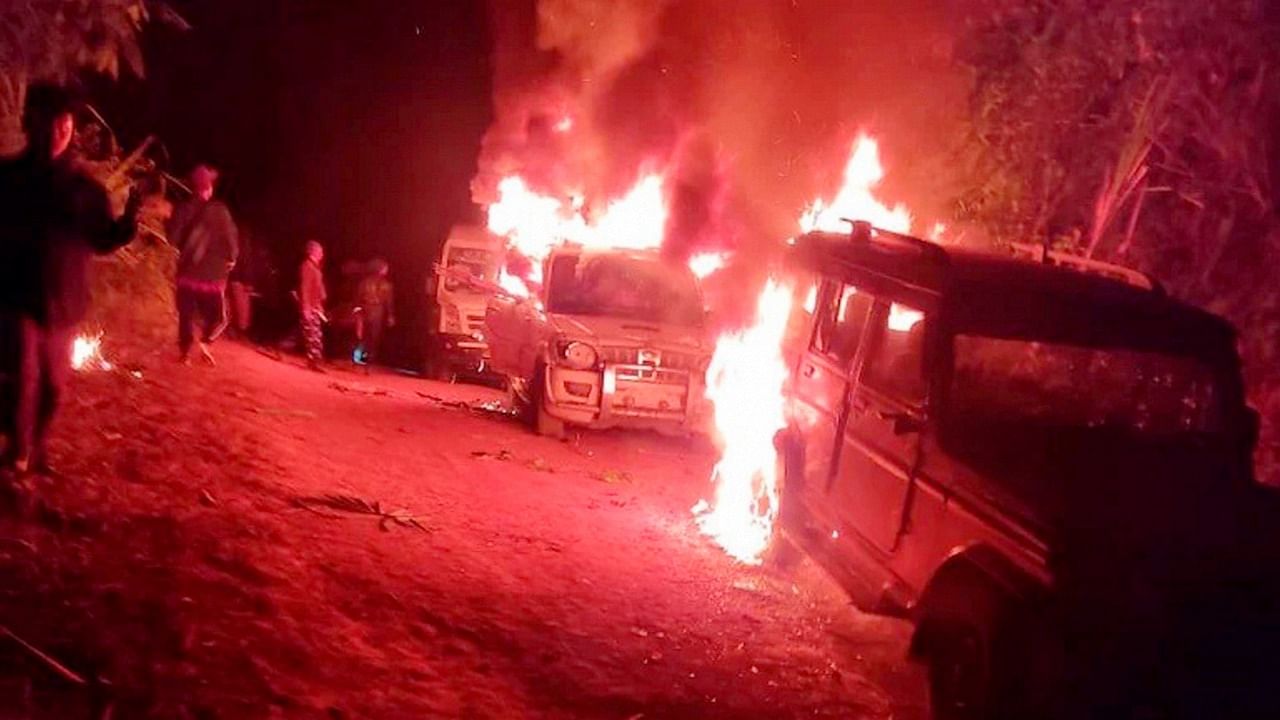 Angry villagers burn vehicles belonging to security personnel after 13 civilians were killed by the security forces from Assam Rifles in an anti-insurgency operations, at Oting village under Mon district of Nagaland. Credit: PTI Photo