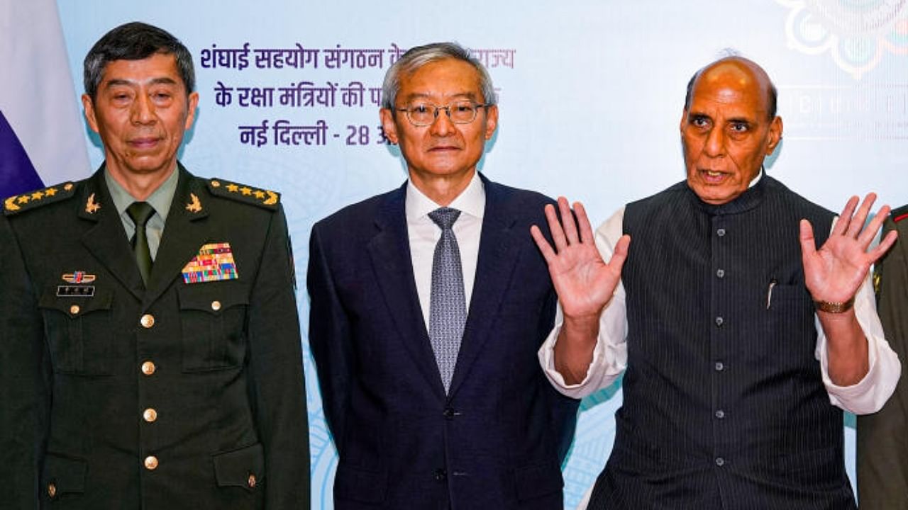 Defence Minister Rajnath Singh, SCO Secretary-General Zhang Ming (2L) and China’s Defence Minister General Li Shangfu (L). Credit: PTI Photo