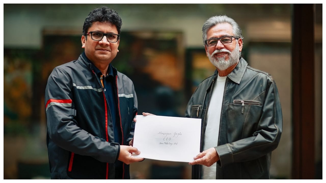 Hero MotoCorp CEO Niranjan Gupta (left) with company's Chairman Dr. Pawan Munjal (right). Credit: Special arrangement