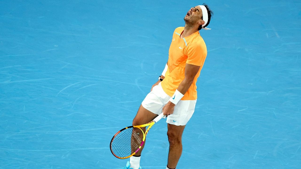 In this file photo taken on January 18, 2023, Spain's Rafael Nadal reacts as he competes against Mackenzie McDonald of the US during his men's singles match on day three of the Australian Open tennis tournament in Melbourne. Credit: AFP File Photo