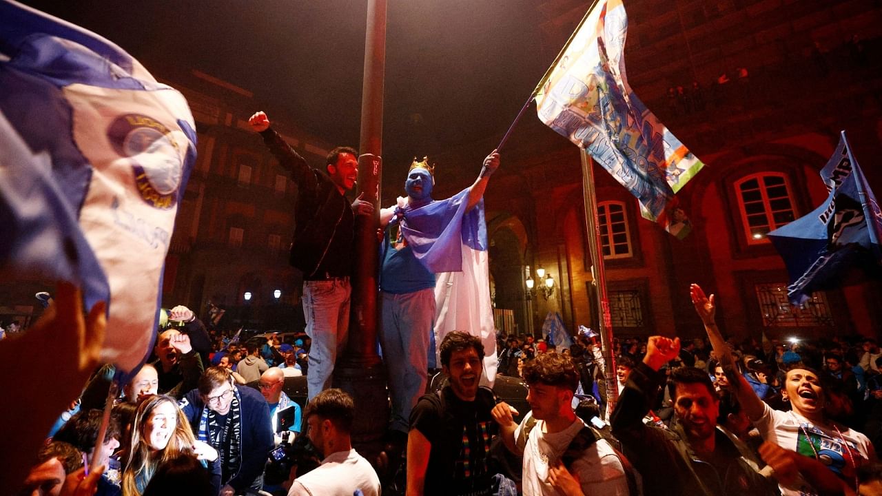 Napoli fans celebrate winning Serie A - Naples, Italy. Credit: Reuters Photo