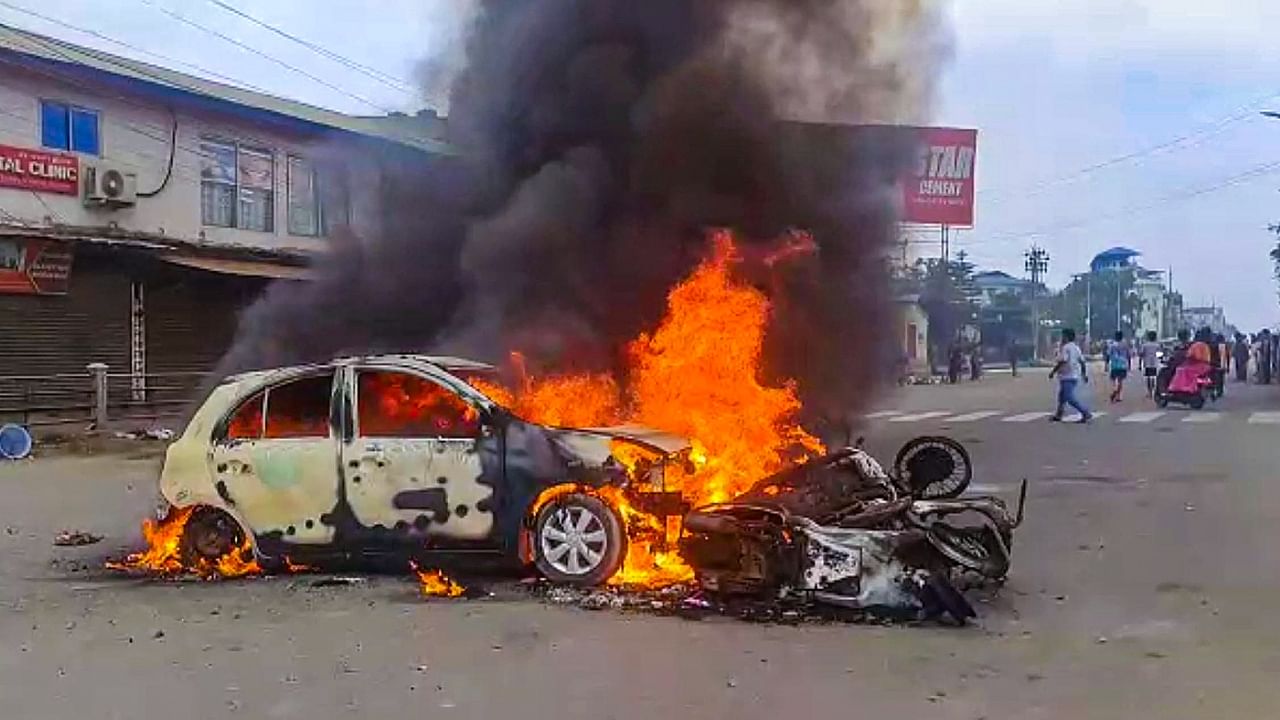 Vehicles in flames after violence broke out during the 'Tribal Solidarity March' called by All Tribal Student Union Manipur (ATSUM), in Imphal, Thursday, May 4, 2023. Credit: PTI Photo