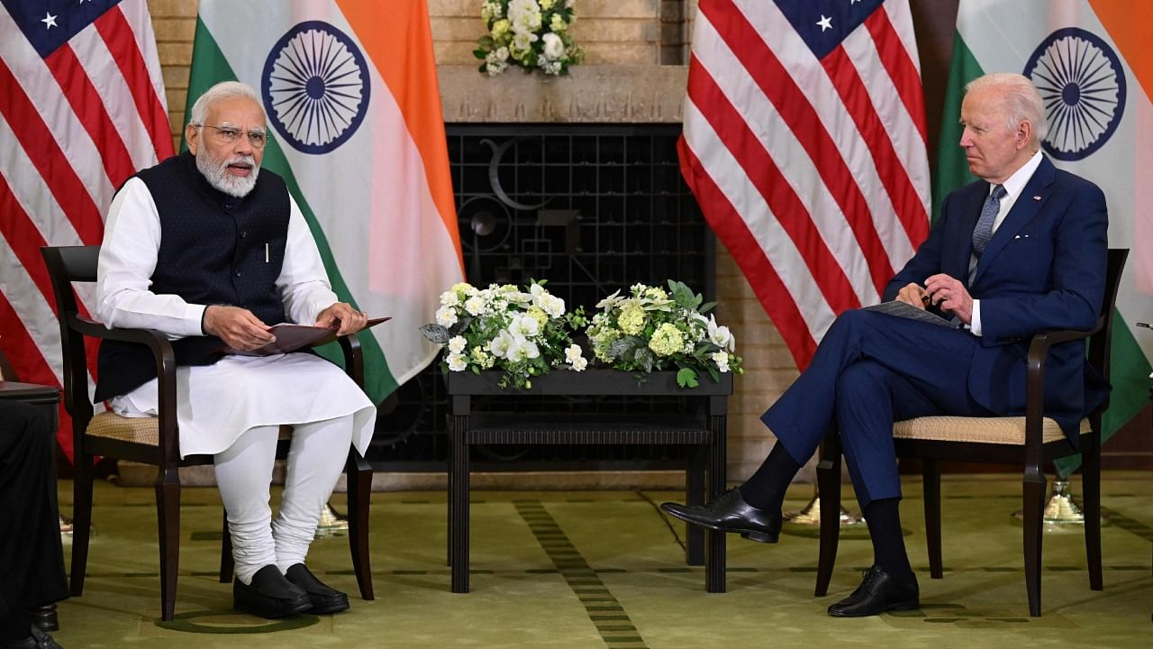 US President Joe Biden (L) and Prime Minister Narendra Modi (R) hold a meeting during the Quad Leaders Summit at Kantei in Tokyo on May 24, 2022. Credit: AFP File Photo