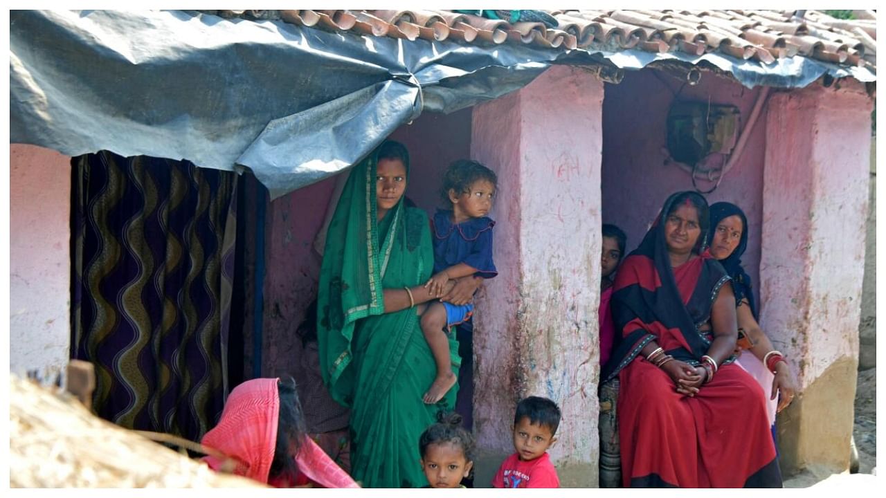 Sita Devi (C), mother-of-two, who is expecting another child, stands along with others at her village house in Darbhanga district of India's Bihar state. Credit: AFP Photo