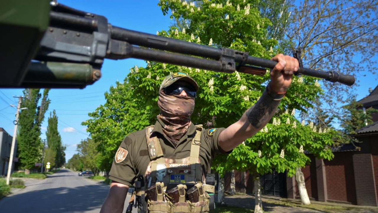 A member of the Ukrainian National Guard's mobile air defence unit looks into the sky as he patrols an area, amid Russia's attack on Ukraine, in Kherson, Ukraine May 5, 2023. Credit: Reuters Photo