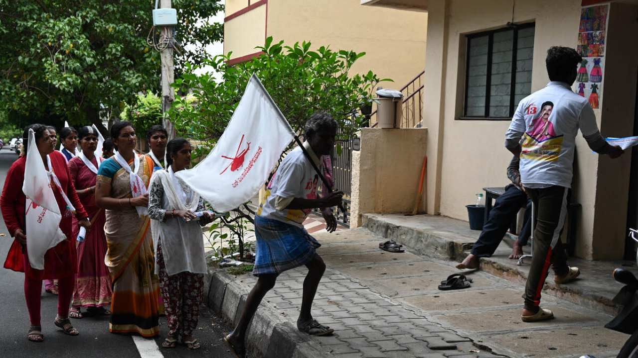 A file photo of supporters of N M Santhosh Kumar, an independent candidate at Hebbal constituency, campaigning in Bengaluru. Credit: Special Arrangement