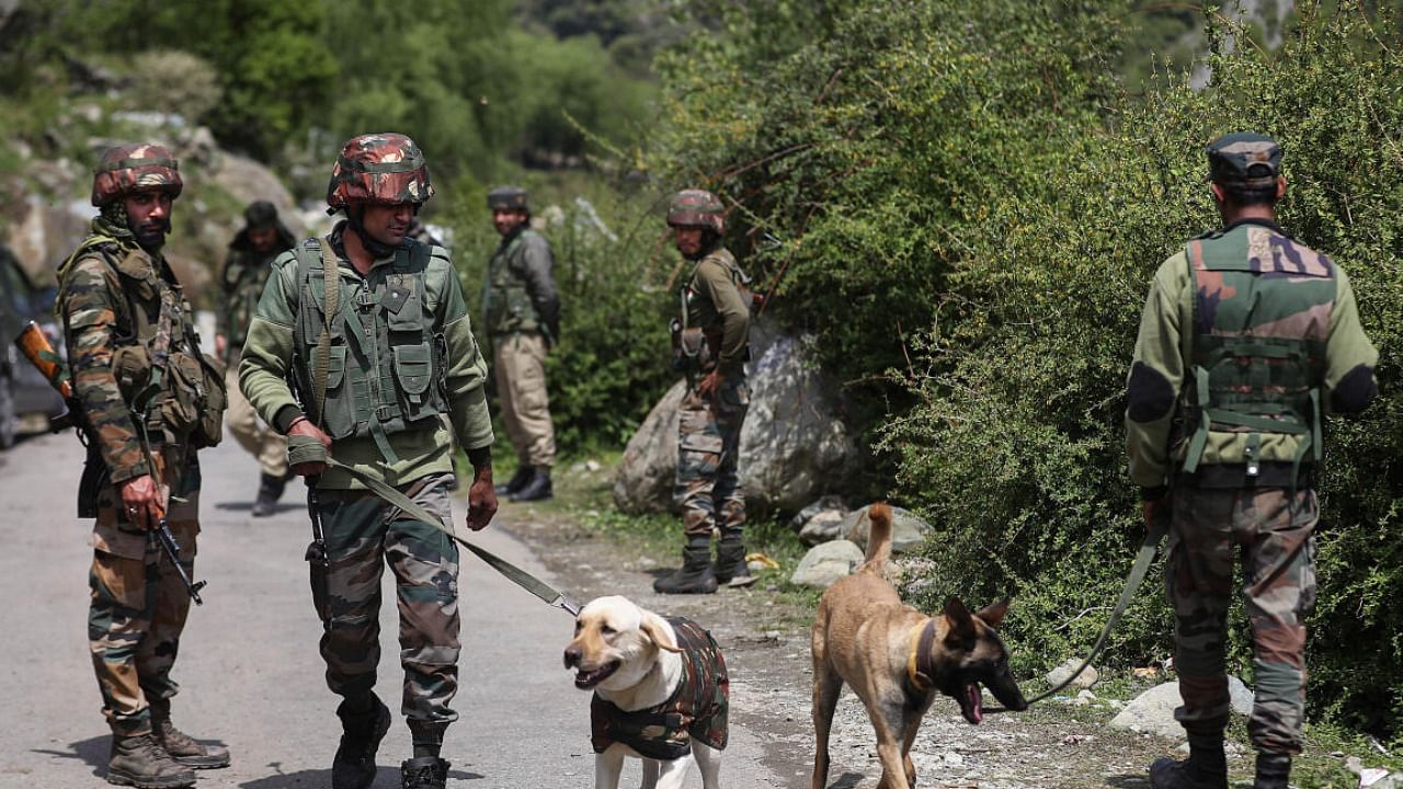 Army's Dog Squad near the site of an encounter with terrorists in Kandi area of Rajouri district. Credit: PTI Photo