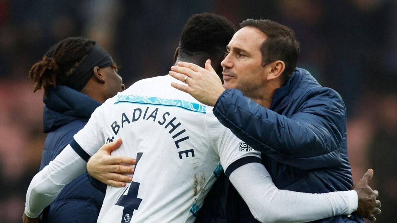Chelsea's French defender Benoit Badiashile (C) celebrates with Chelsea's English interim manager Frank Lampard during the English Premier League football match between Bournemouth and Chelsea. credit: AFP Photo