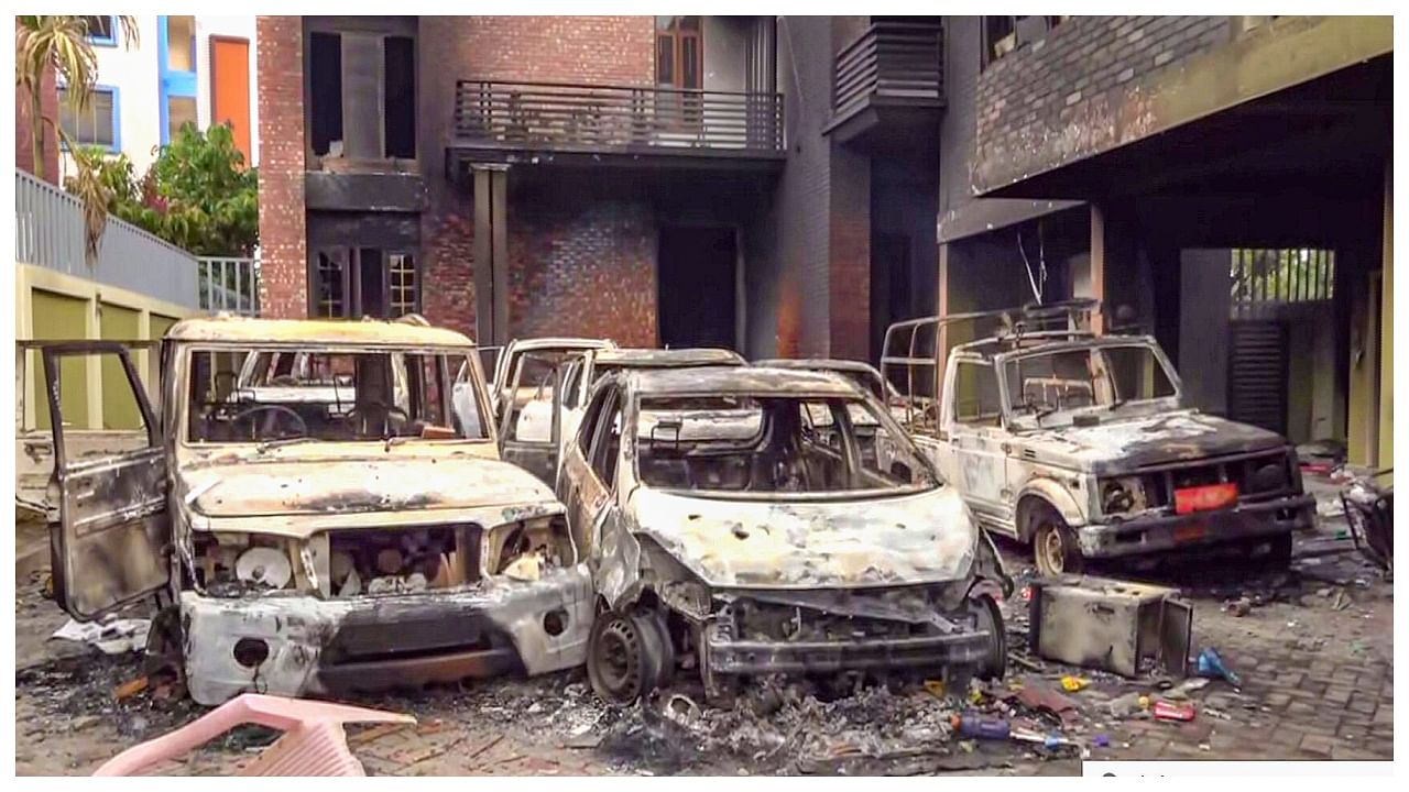 Charred vehicles which were set ablaze following tribal groups' protests over court order on Scheduled Tribe status, in Imphal, Manipur, Friday, May 5, 2023. Credit: PTI Photo