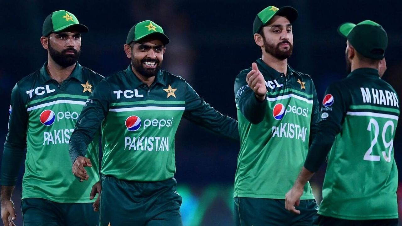 Pakistan's captain Babar Azam (2ND-L) and his teammates celebrate after winning the fourth one-day international (ODI) cricket match between Pakistan and New Zealand at the National Stadium in Karachi on May 5, 2023. Credit: AFP Photo