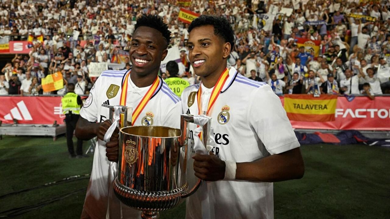 Vinicius, Rodrygo celebrate their triumph. Credit: AFP Photo