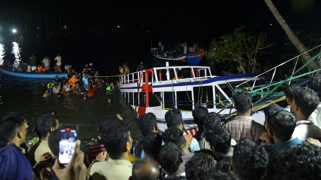 Rescue team members search for survivors after a boat capsized off the coastal town of Tanur in Malappuram district, Kerala, May 7, 2023. Credit: Reuters Photo