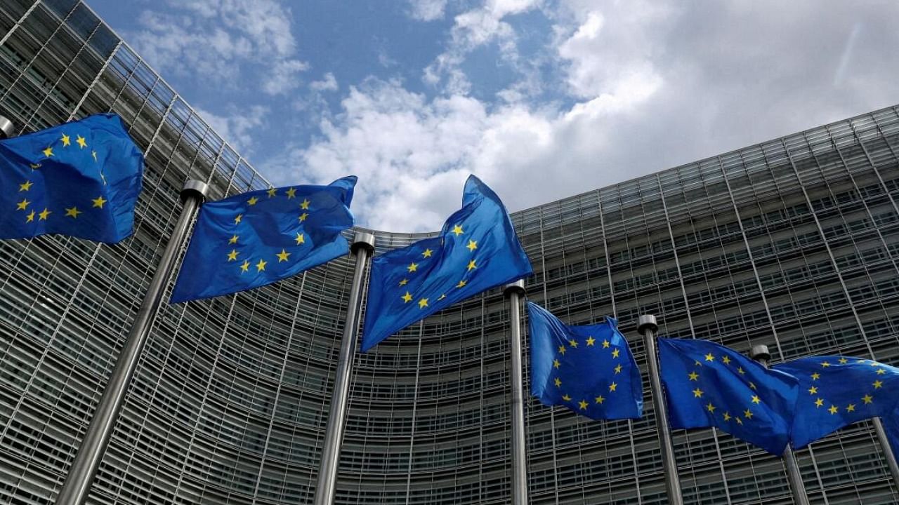 European Union flags flutter outside the European Commission headquarters in Brussels. Credit: Reuters Photo