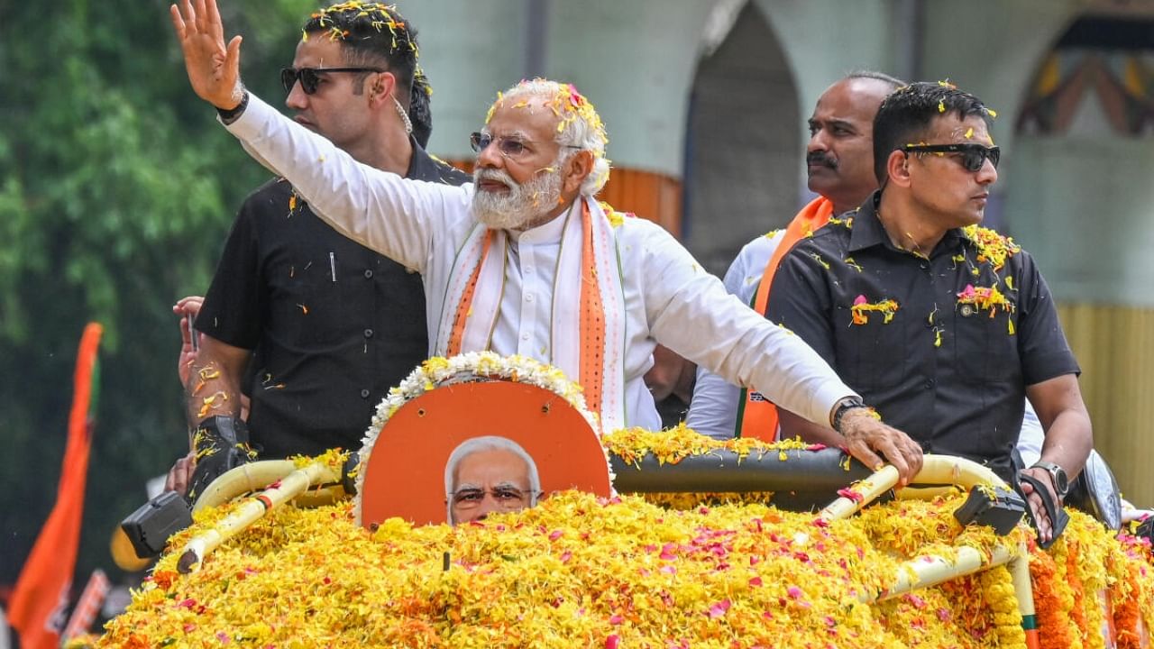 PM Narendra Modi during the roadshow in Bengaluru on Sunday. Credit: DH Photo/S K Dinesh