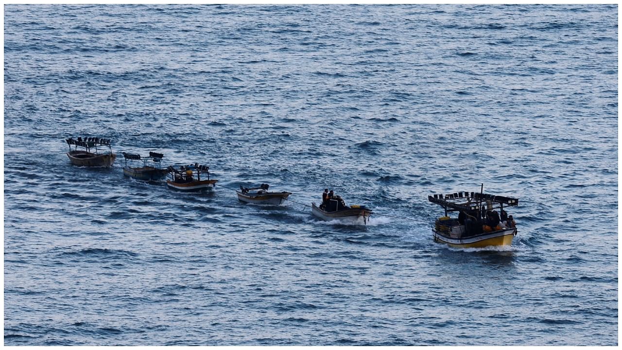 Boats travel in a line in the aftermath of Israeli military strikes on Islamic Jihad targets, in Gaza, May 9, 2023. Credit: Reuters Photo