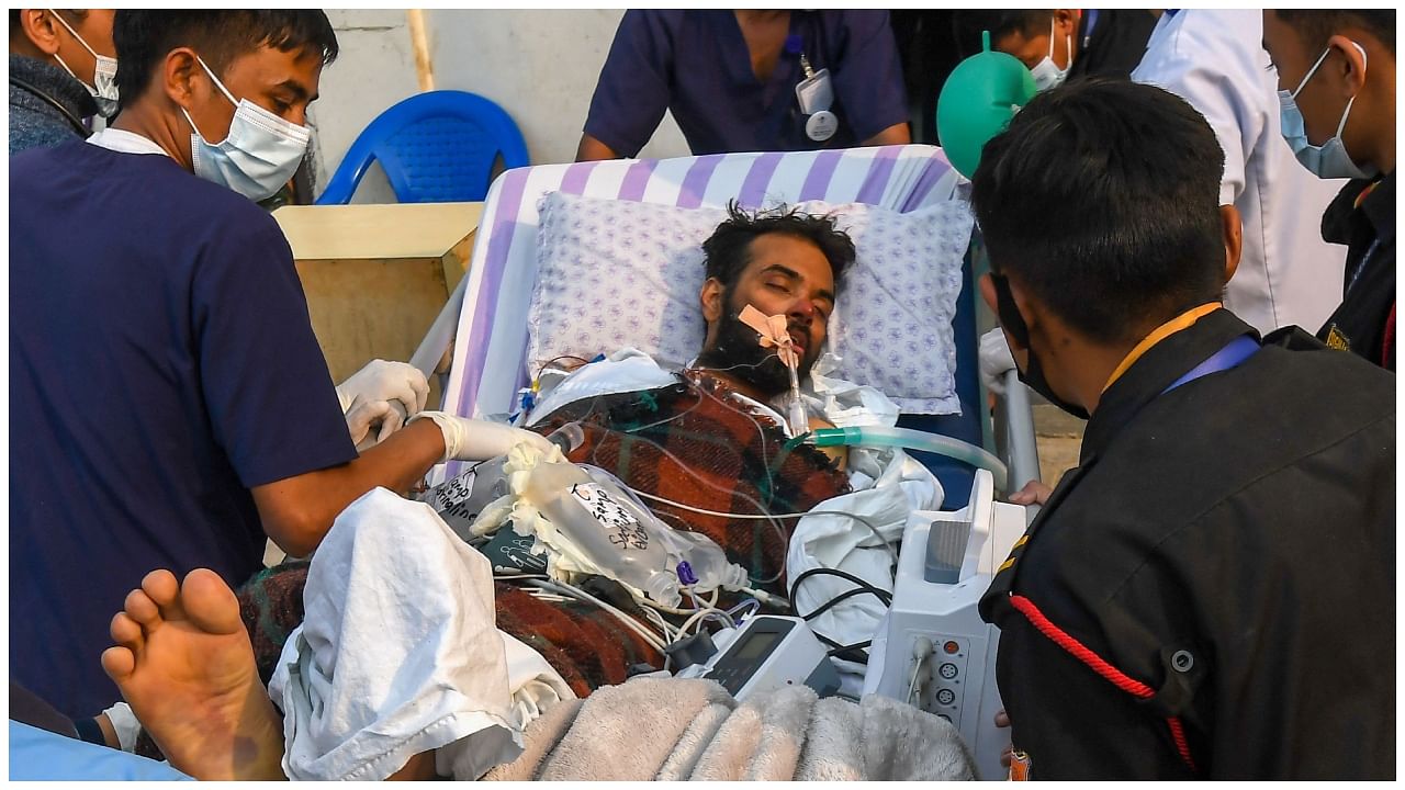 Medical staff and rescue personnel take Indian climber Anurag Maloo to a hospital after being airlifted, in Lalitpur on the outskirts of Kathmandu on April 20, 2023. Credit: AFP Photo