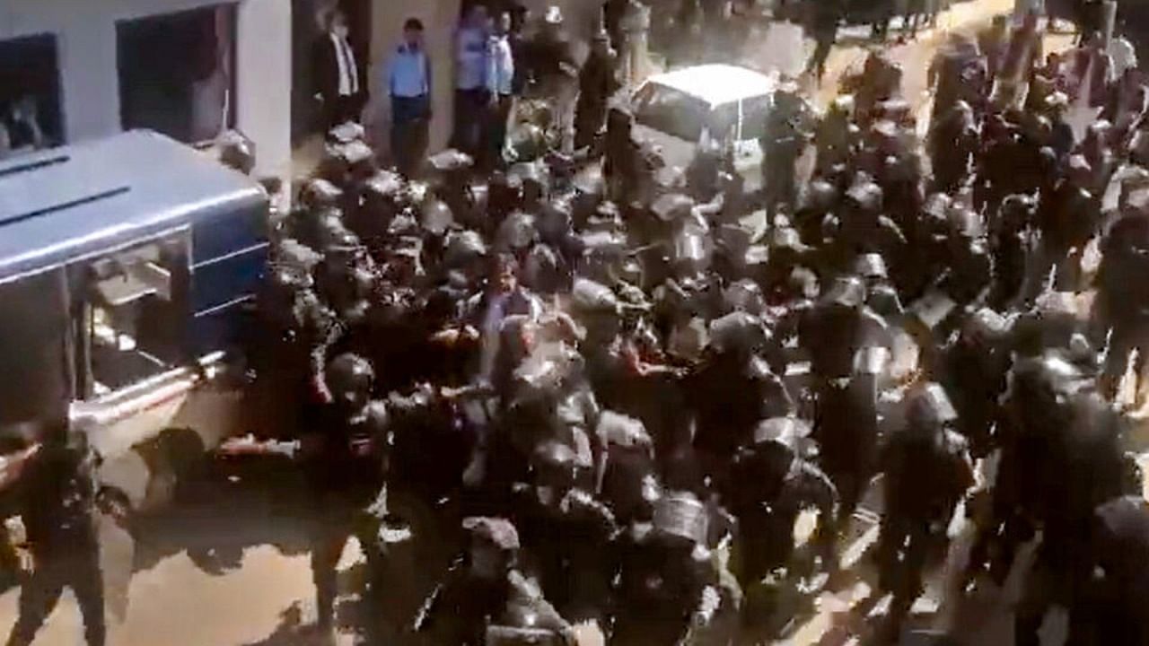 : Former prime minister of Pakistan and Pakistan Tehreek-e-Insaf chief Imran Khan being arrested by paramilitary Rangers from outside the Islamabad High Court, where he was present for a hearing of a corruption case, in Islamabad, Tuesday, May 9, 2023. Credit: PTI Photo