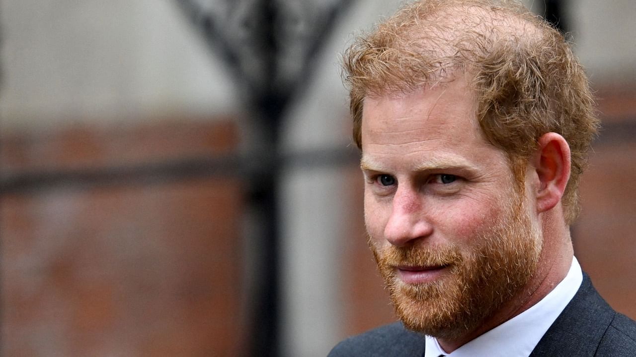  Prince Harry walks outside the High Court, in London. Credit: Reuters Photo