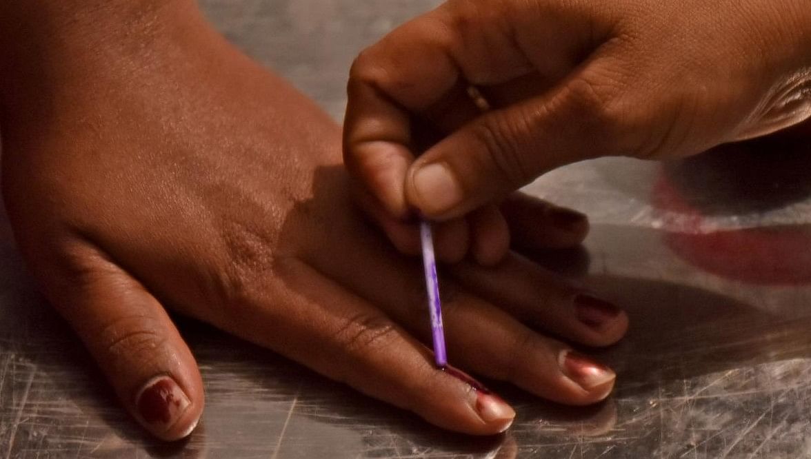 Voter getting her finger inked after completion of voting exercise. Credit: DH Photo/ M S Manjunath