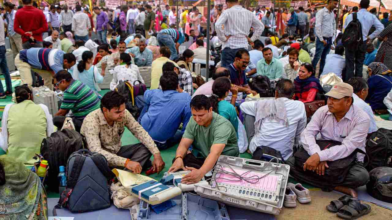 Ghaziabad: Polling officials collect EVMs and other election materal ahead of the second phase of UP Municipal elections, at a distribution centre in Ghaziabad, Wednesday, May 10, 2023. Credit: PTI Photo