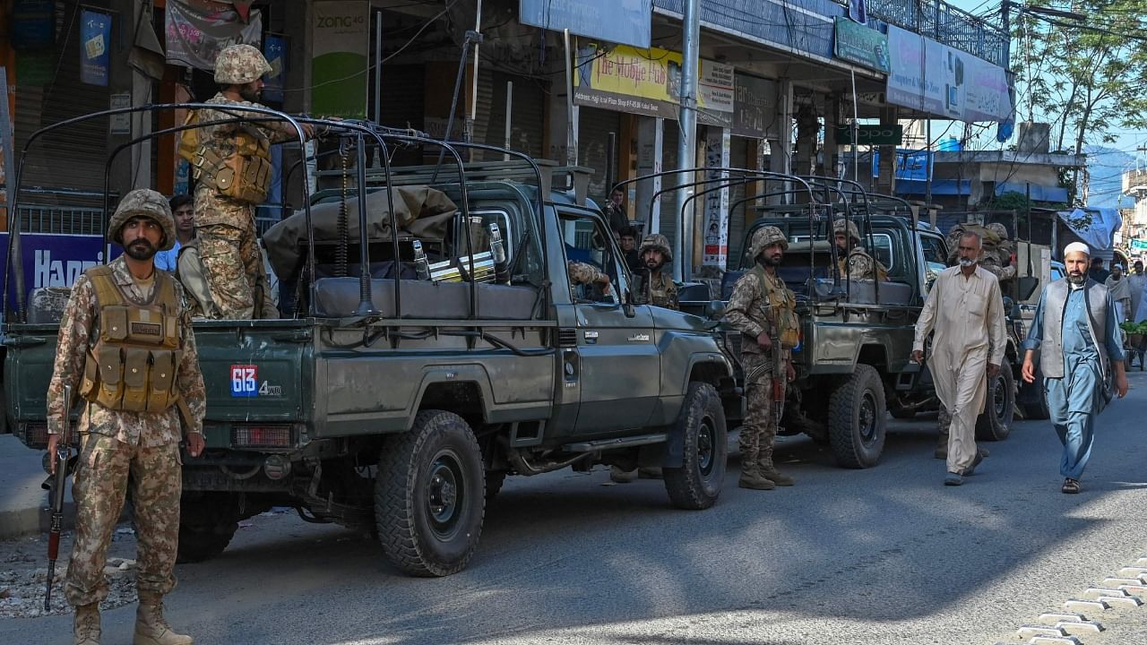 Army troops stand guard along a street in Kabal town of Swat Valley in Pakistan’s northwestern region of Khyber Pakhtunkhwa province. Credit: AFP File Photo