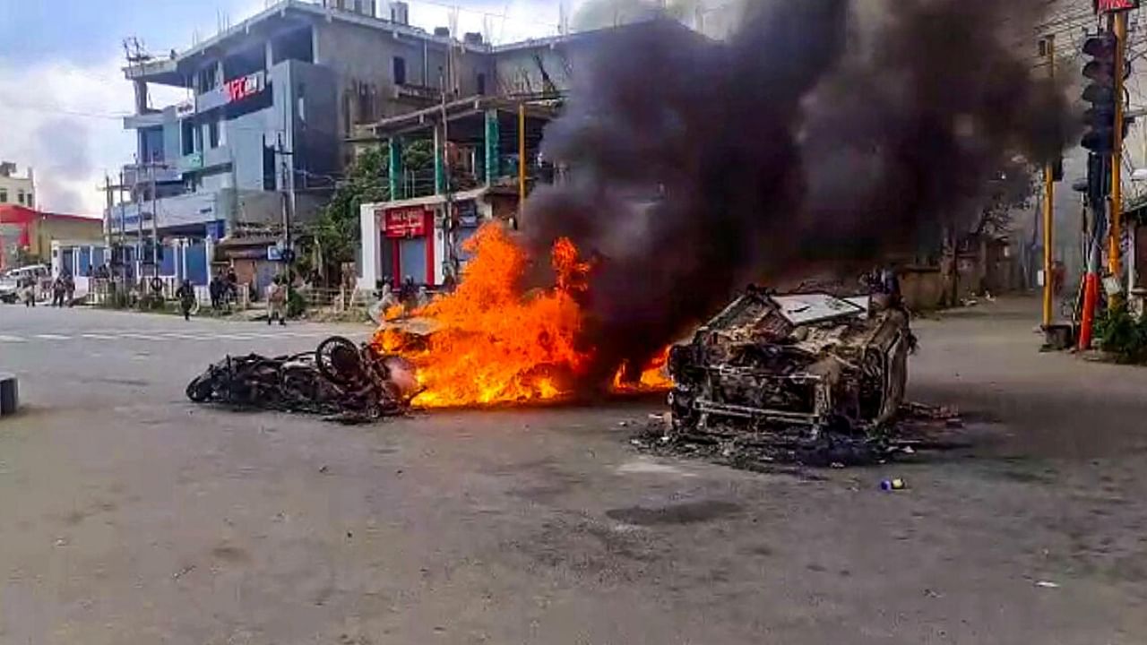 Vehicles in flames after violence broke out during the 'Tribal Solidarity March' called by All Tribal Student Union Manipur (ATSUM), in Imphal, Thursday, May 4, 2023. Credit: PTI Photo