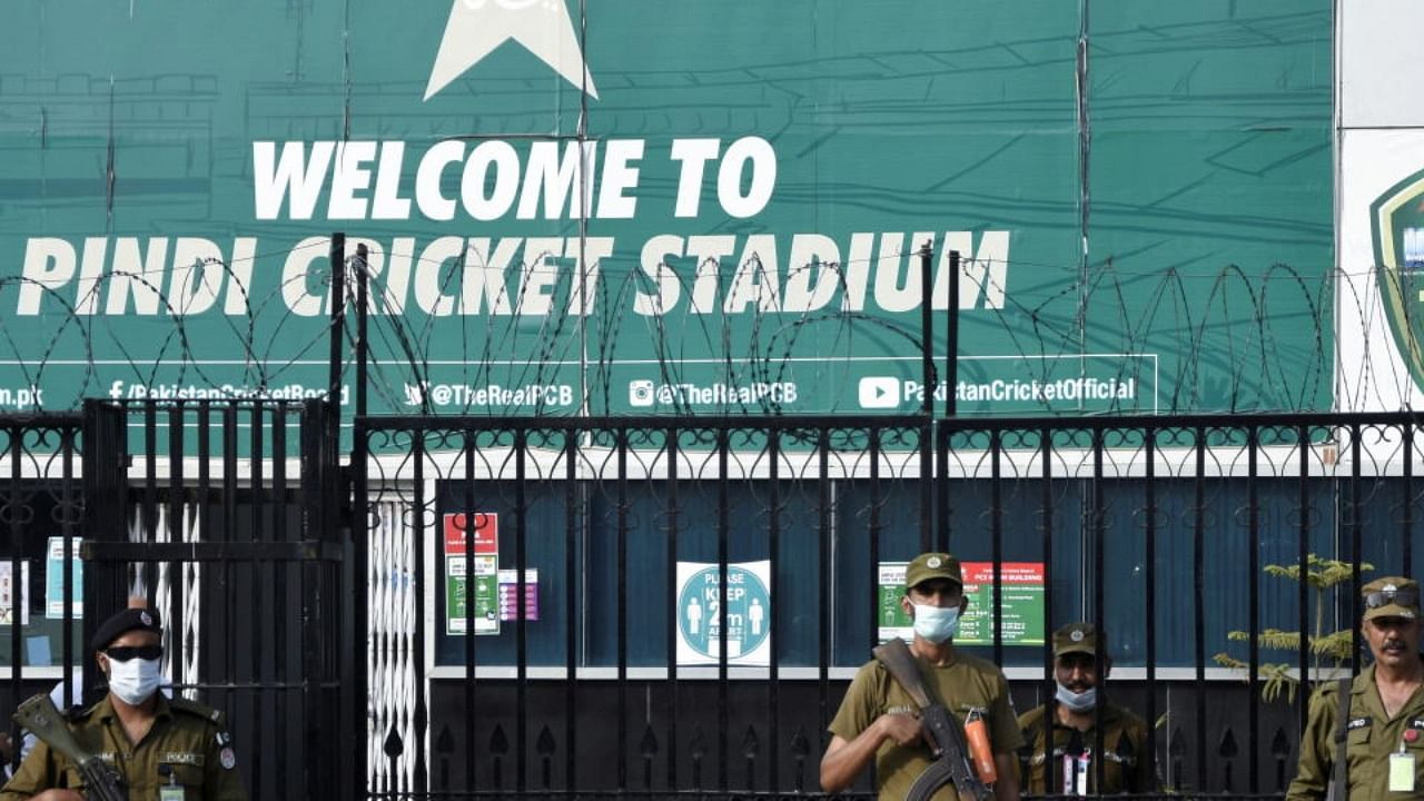 Police officers stand guard outside Rawalpindi Cricket Stadium. Credit: Reuters Photo