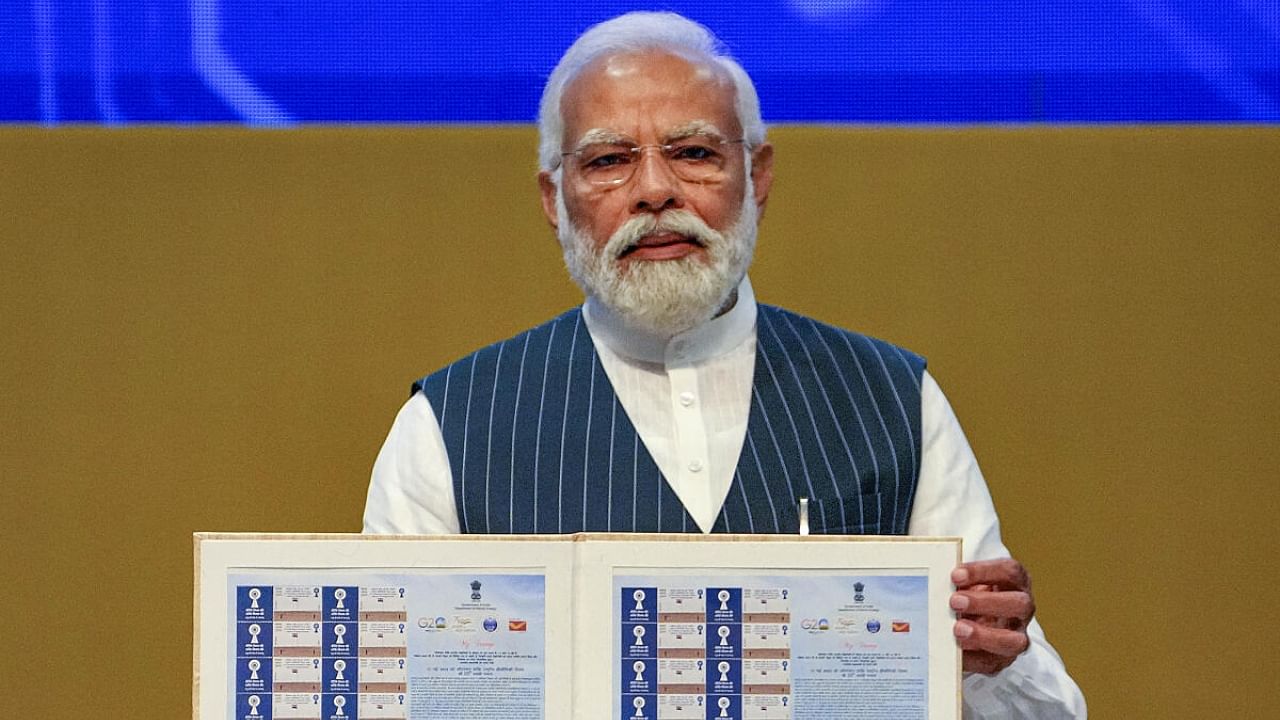 Prime Minister Narendra Modi releases commemorative postage stamp at the National Technology Day function at Pragati Maidan in New Delhi, Thursday, May 11, 2023. Credit: PTI Photo